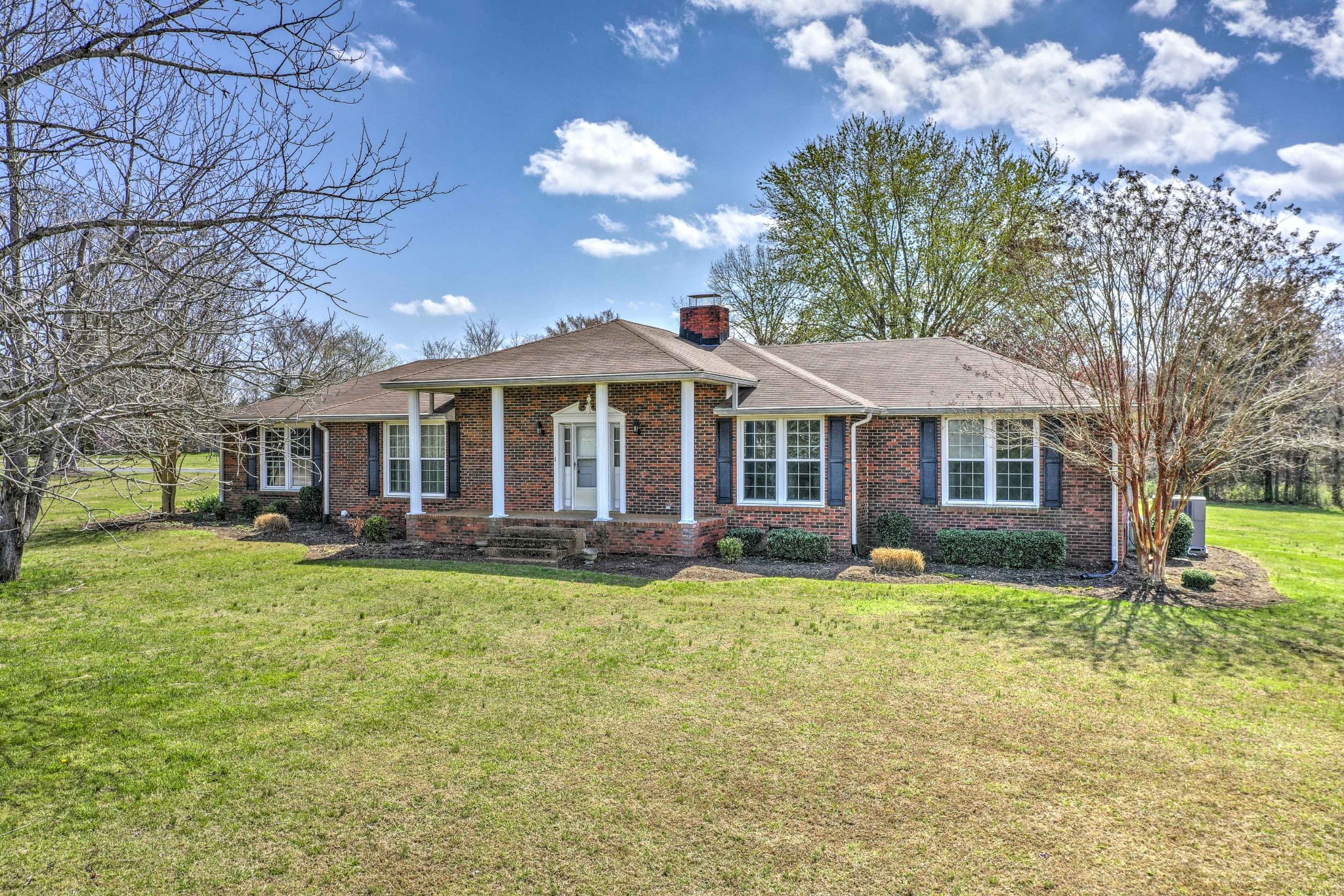 223 Lohman Road Mount Juliet, TN 37122 - Photo 1 of 15 a front view of a house with swimming pool having outdoor seating
