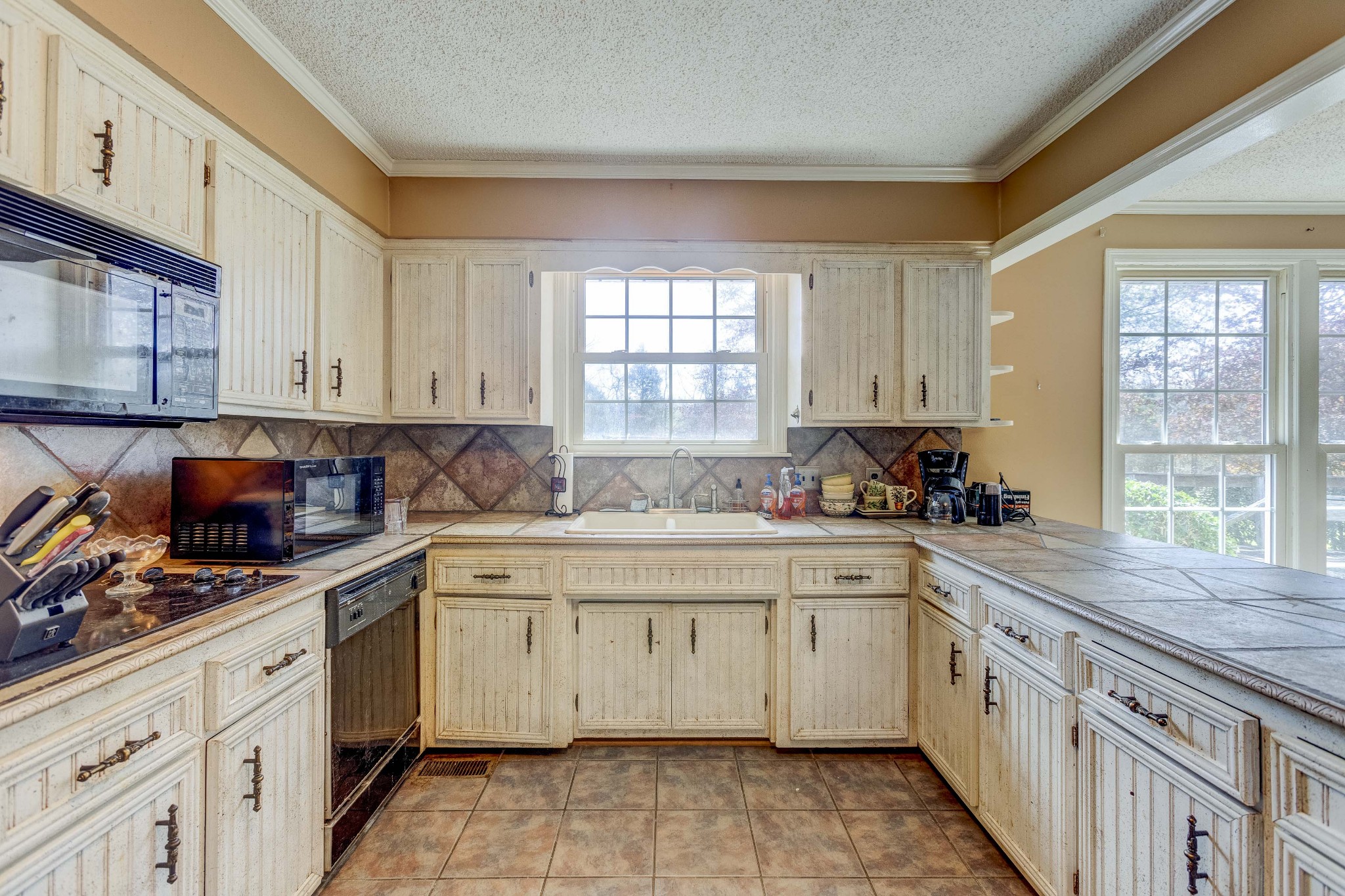 223 Lohman Road Mount Juliet, TN 37122 - Photo 15 of 15 a kitchen with a sink stove and cabinets