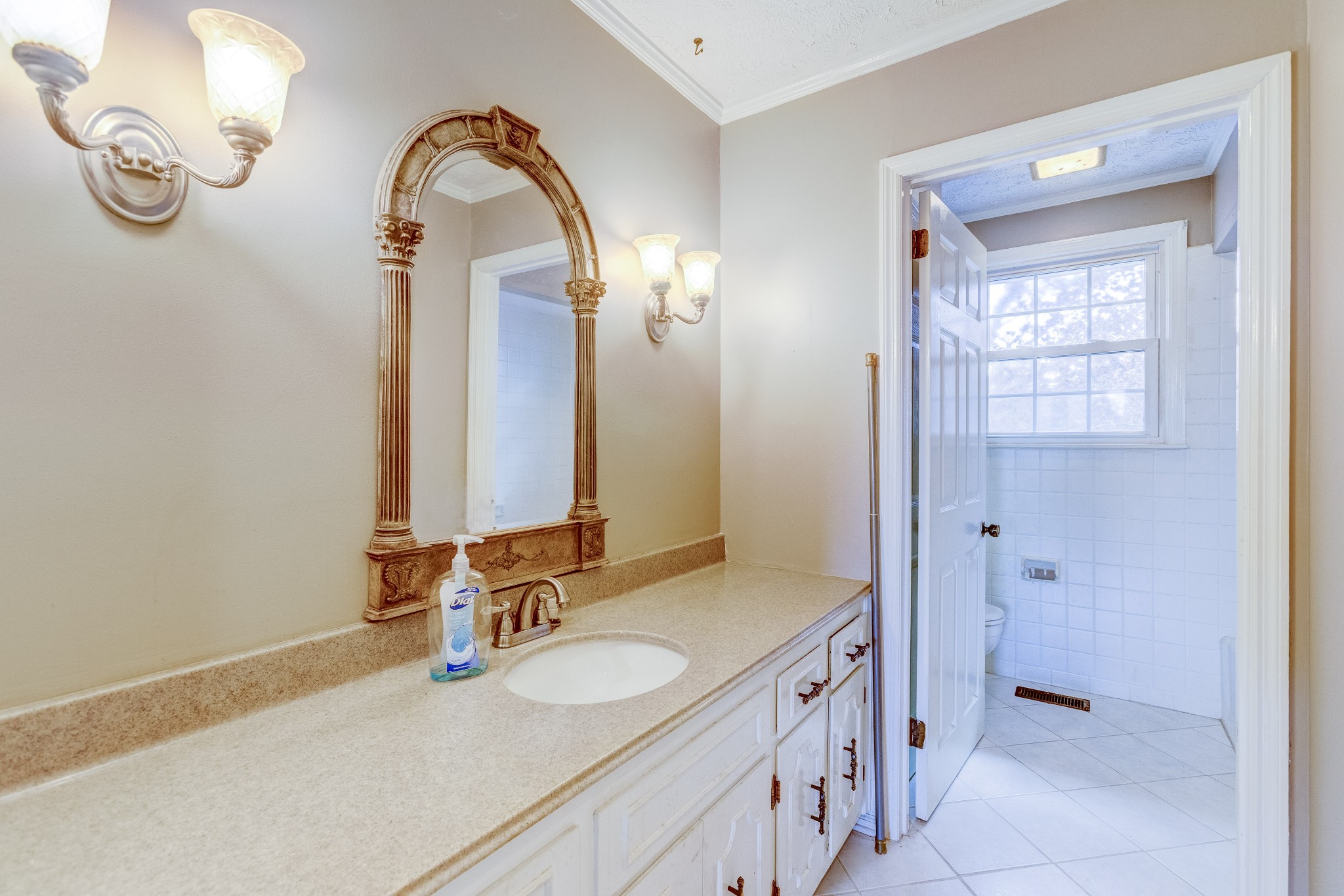 223 Lohman Road Mount Juliet, TN 37122 - Photo 8 of 15 a bathroom with a double vanity sink and a mirror
