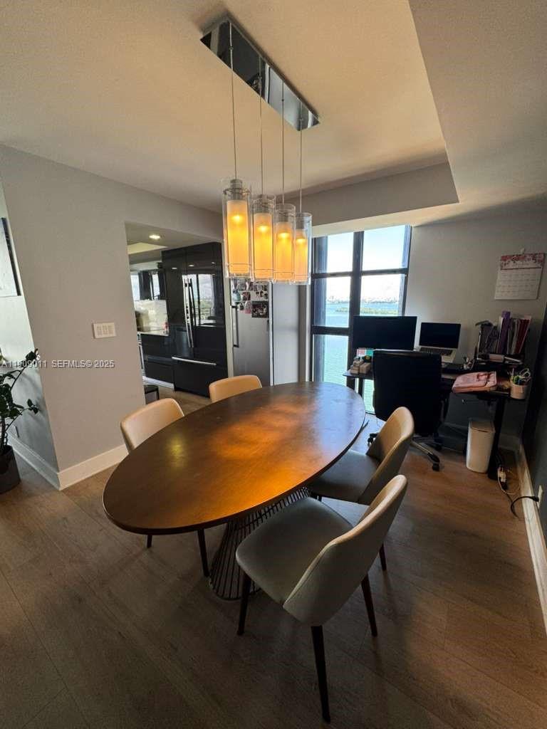 4000 Towerside Terrace, Unit 1901 Miami, FL 33138 - Photo 18 of 36 a view of a dining room with furniture