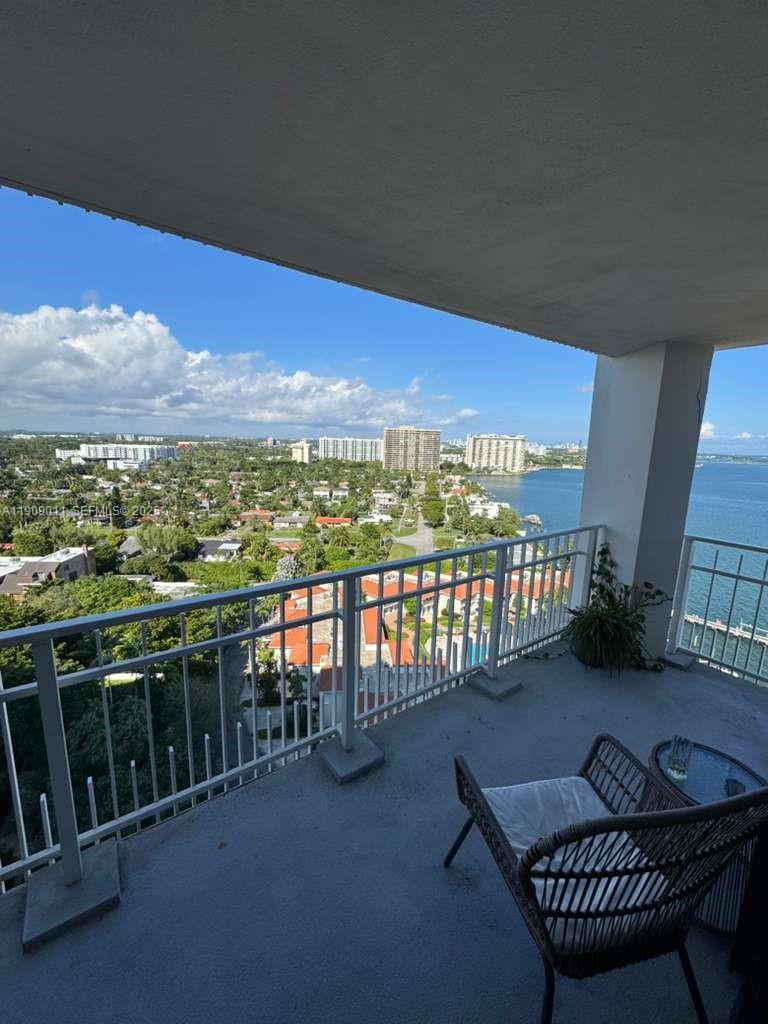 4000 Towerside Terrace, Unit 1901 Miami, FL 33138 - Photo 4 of 36 a view of a balcony with furniture