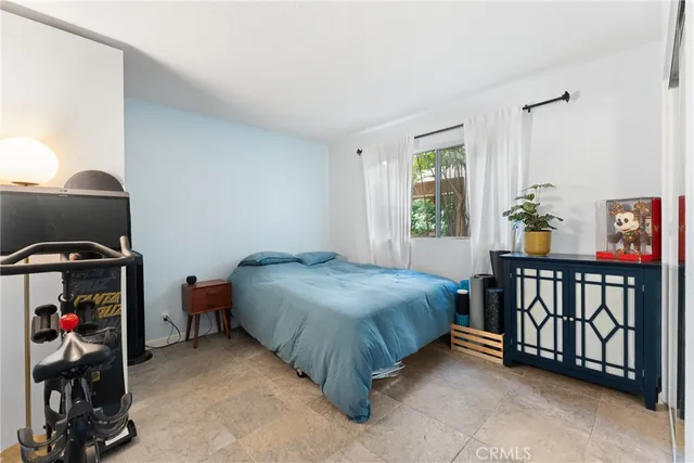 a bathroom with a sink a mirror and a toilet