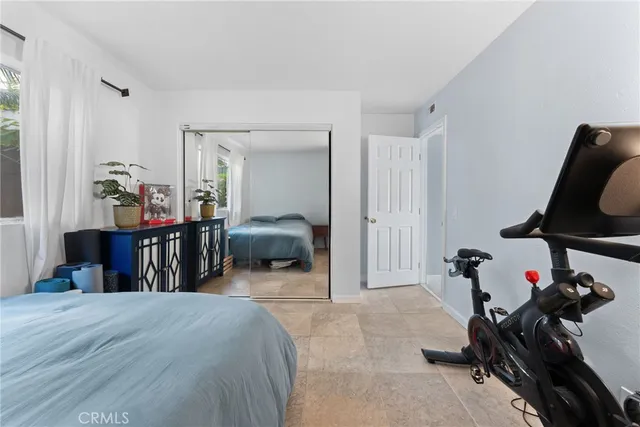 a view of a balcony with furniture