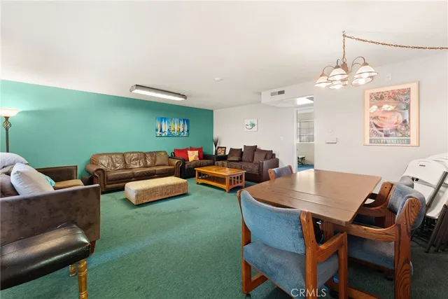 a view of room with window and wooden floor