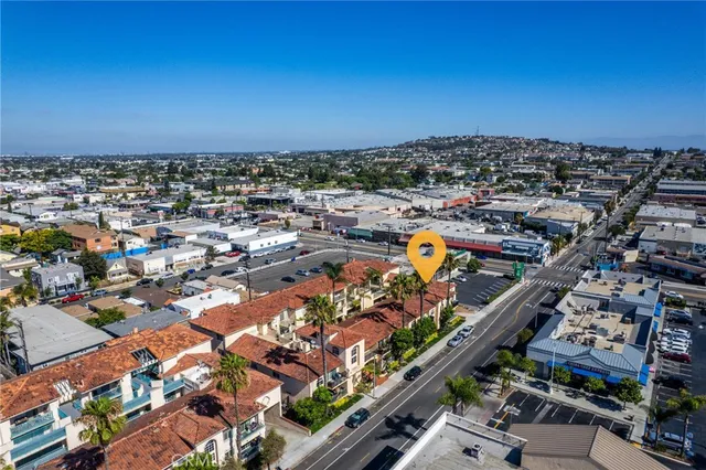 an aerial view of a city with lots of residential buildings