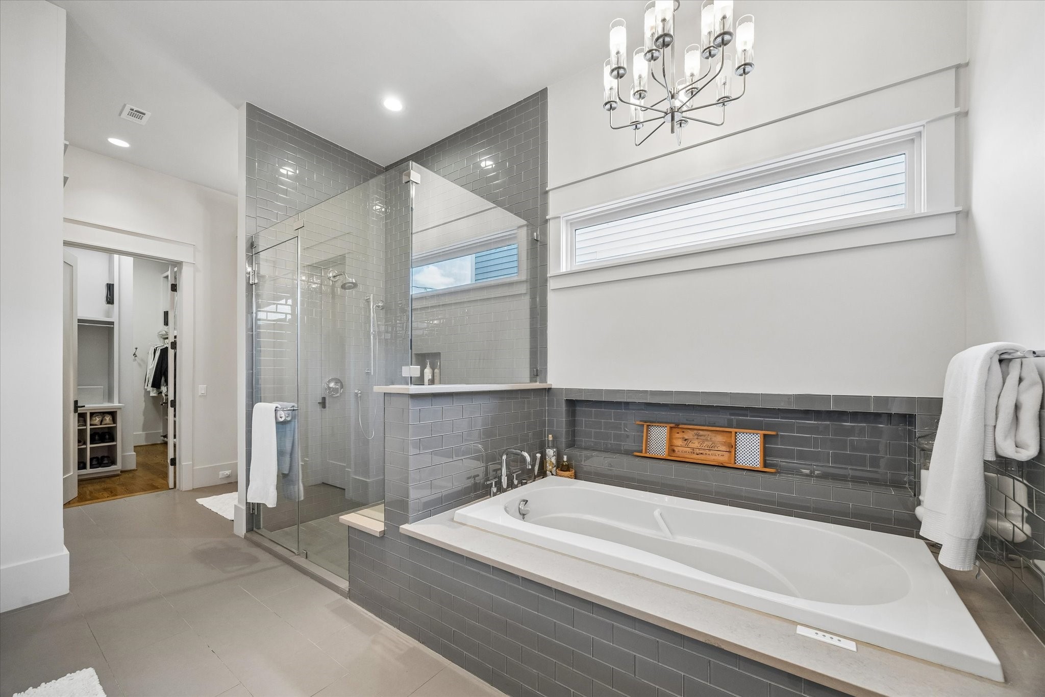 1101 Omar Street Houston, TX 77009 - Photo 21 of 46 The spacious primary bath offers a spa-like retreat with an oversized shower, large Jacuzzi soaking tub, and timeless finishes designed for comfort and relaxation.