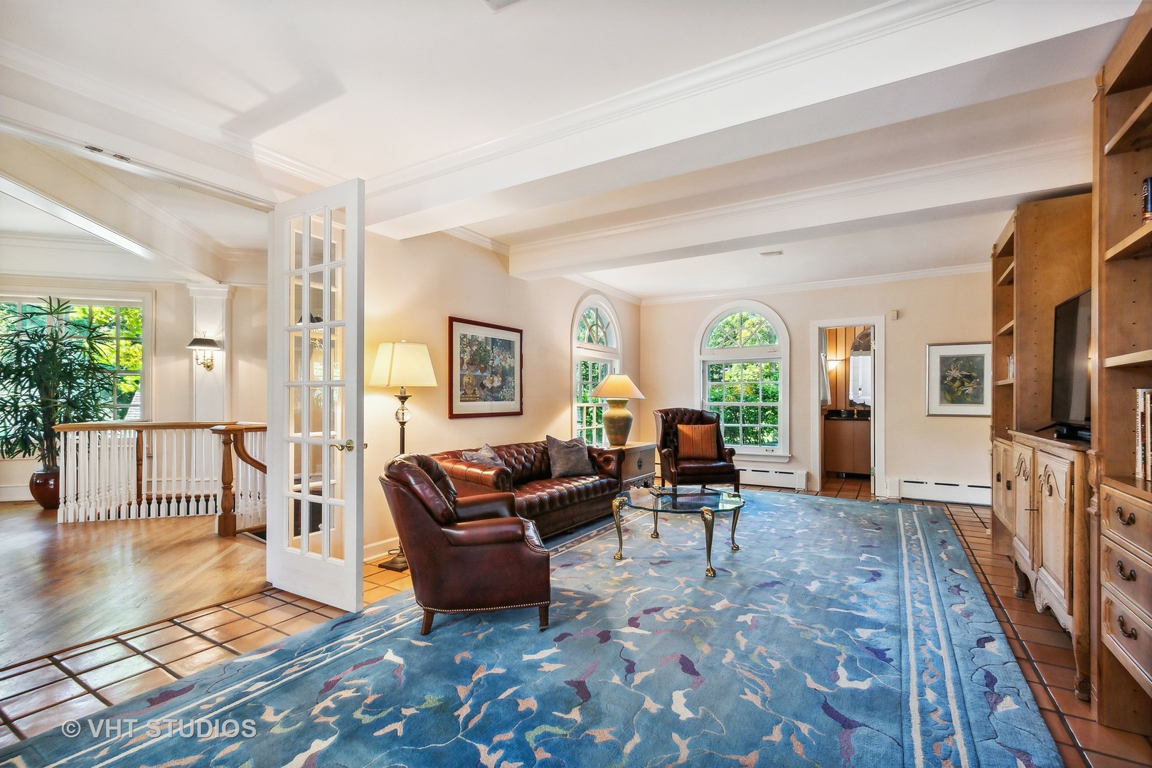 5 West County Line Road Barrington Hills, IL 60010 - Photo 16 of 77 a living room with furniture and a flat screen tv