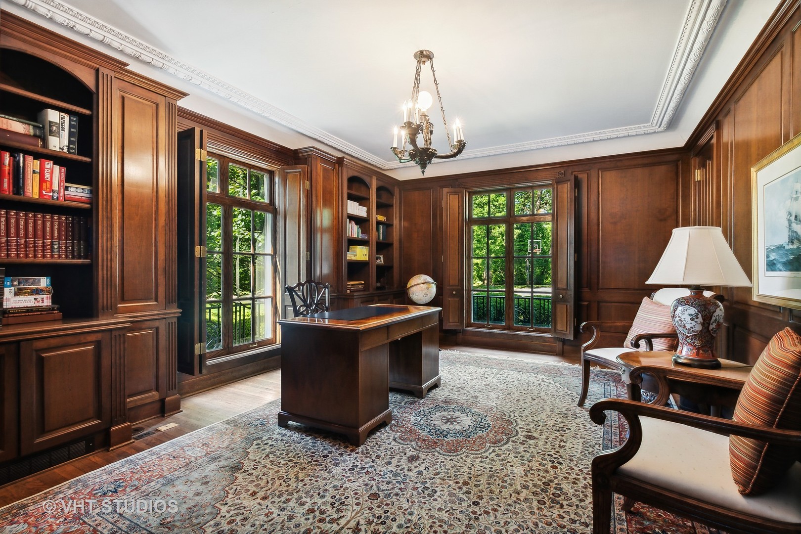 5 West County Line Road Barrington Hills, IL 60010 - Photo 23 of 77 a living room with furniture a window and a chandelier