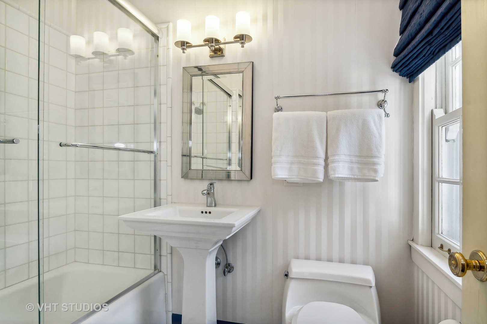 5 West County Line Road Barrington Hills, IL 60010 - Photo 31 of 77 a bathroom with a sink a toilet and shower