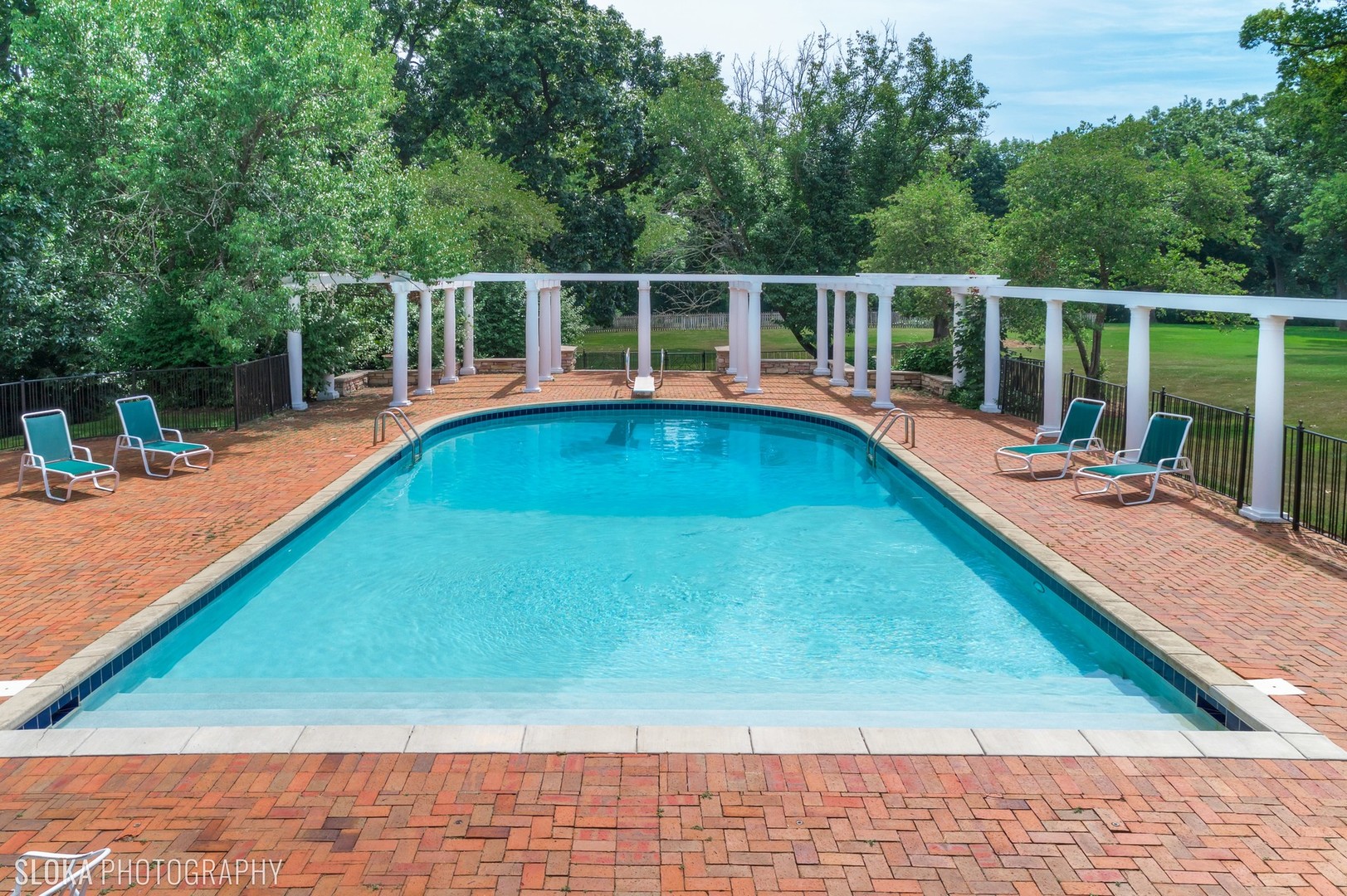 5 West County Line Road Barrington Hills, IL 60010 - Photo 38 of 77 a view of a swimming pool with a deck