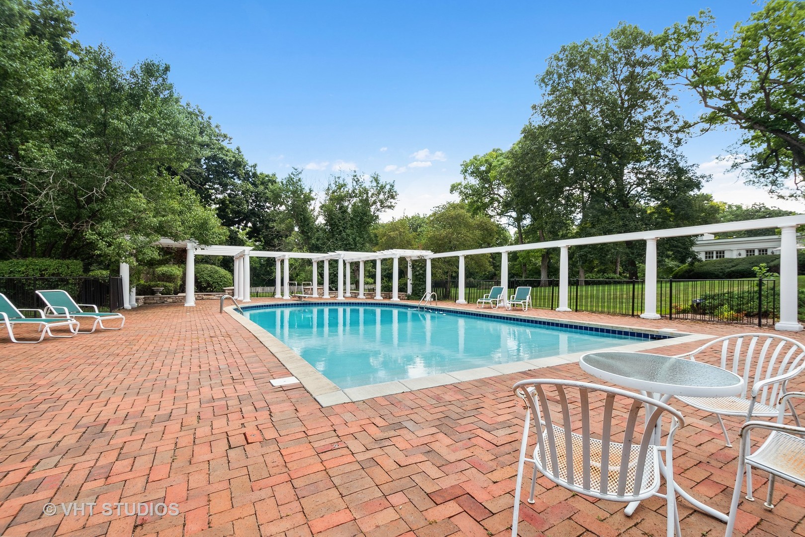 5 West County Line Road Barrington Hills, IL 60010 - Photo 39 of 77 a view of a swimming pool with a deck