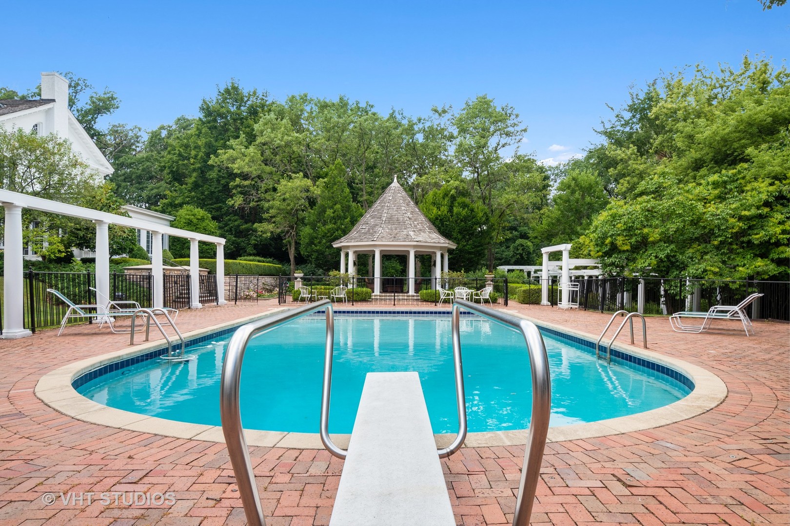 5 West County Line Road Barrington Hills, IL 60010 - Photo 41 of 77 a view of a house with pool and sitting area