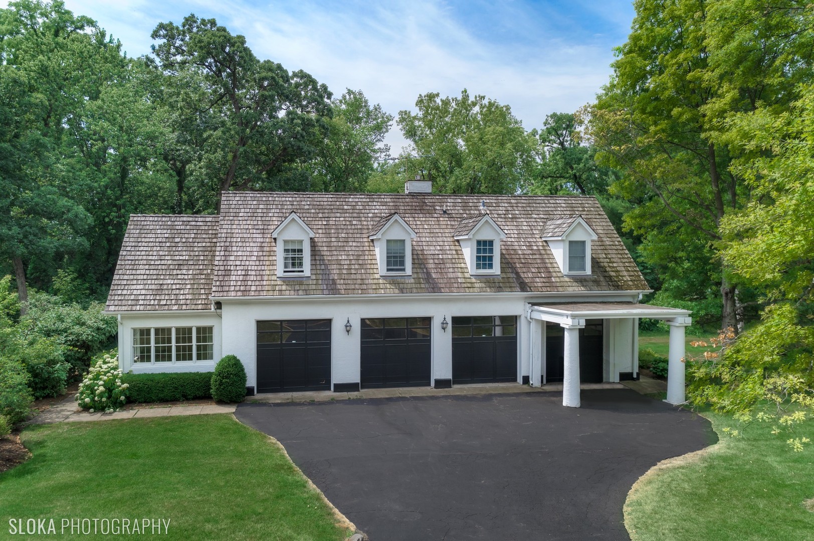 5 West County Line Road Barrington Hills, IL 60010 - Photo 51 of 77 front view of a house with a yard