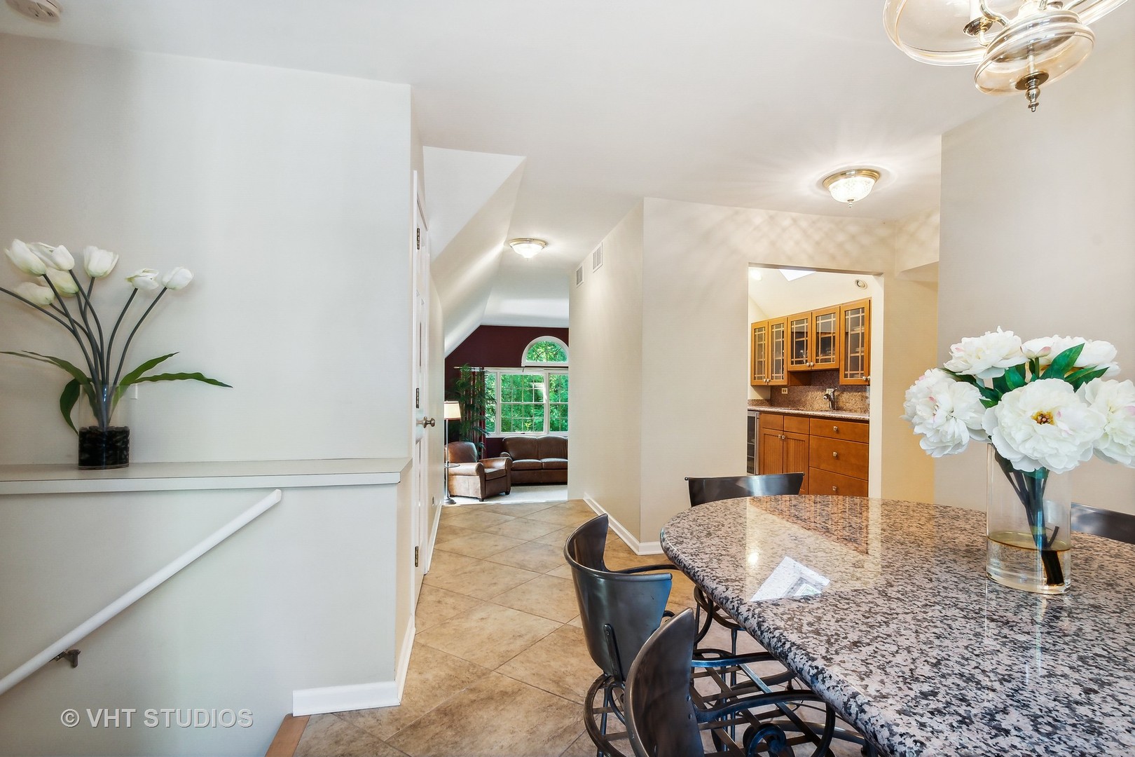 5 West County Line Road Barrington Hills, IL 60010 - Photo 54 of 77 a living room with furniture a potted plant and a rug