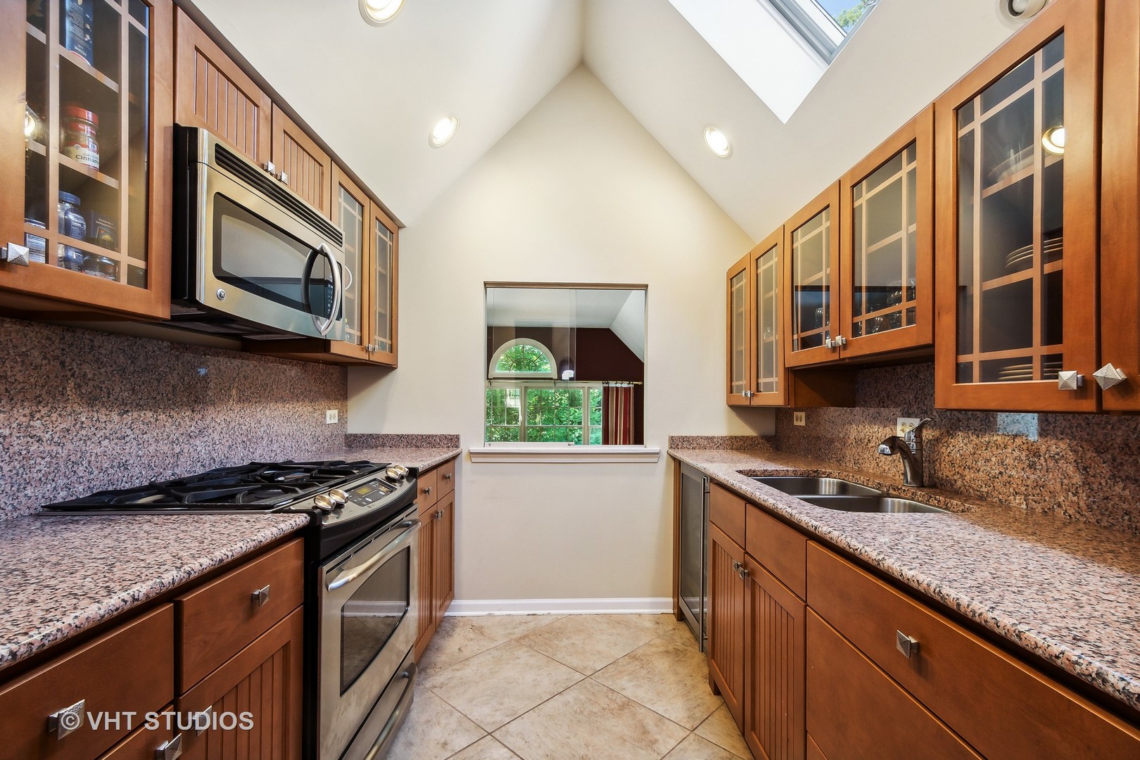 5 West County Line Road Barrington Hills, IL 60010 - Photo 55 of 77 a kitchen with stainless steel appliances granite countertop a stove and a sink
