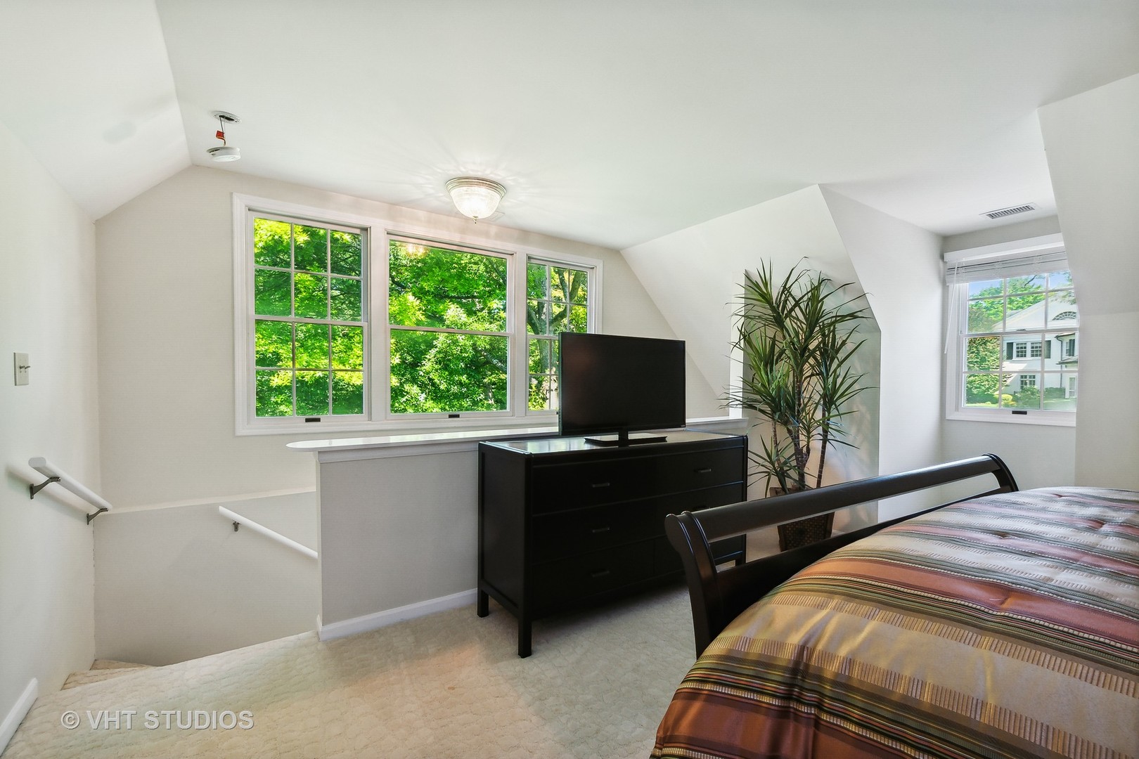5 West County Line Road Barrington Hills, IL 60010 - Photo 57 of 77 a bedroom with a bed and a flat screen tv