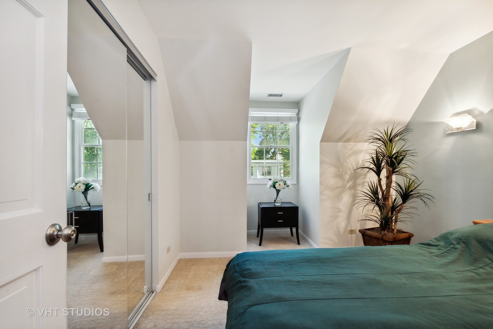 5 West County Line Road Barrington Hills, IL 60010 - Photo 58 of 77 a bedroom with a bed and a potted plant