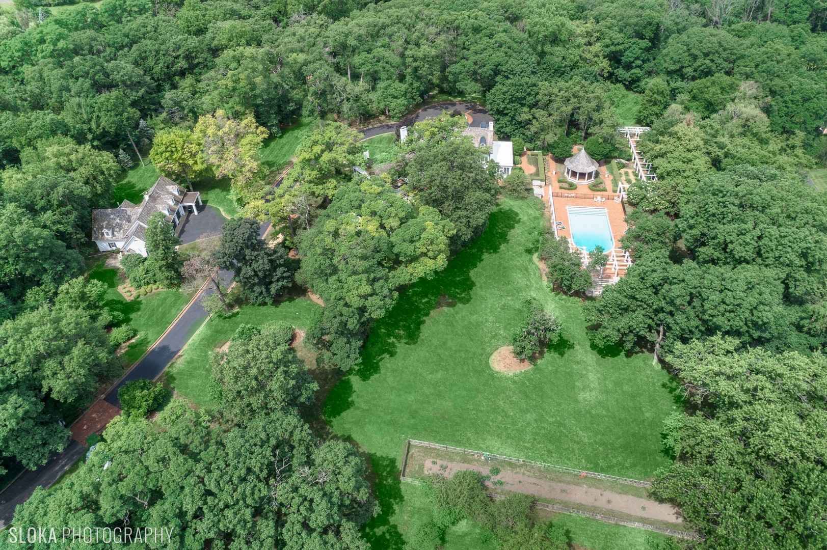 5 West County Line Road Barrington Hills, IL 60010 - Photo 69 of 77 an aerial view of residential house with outdoor space and trees all around