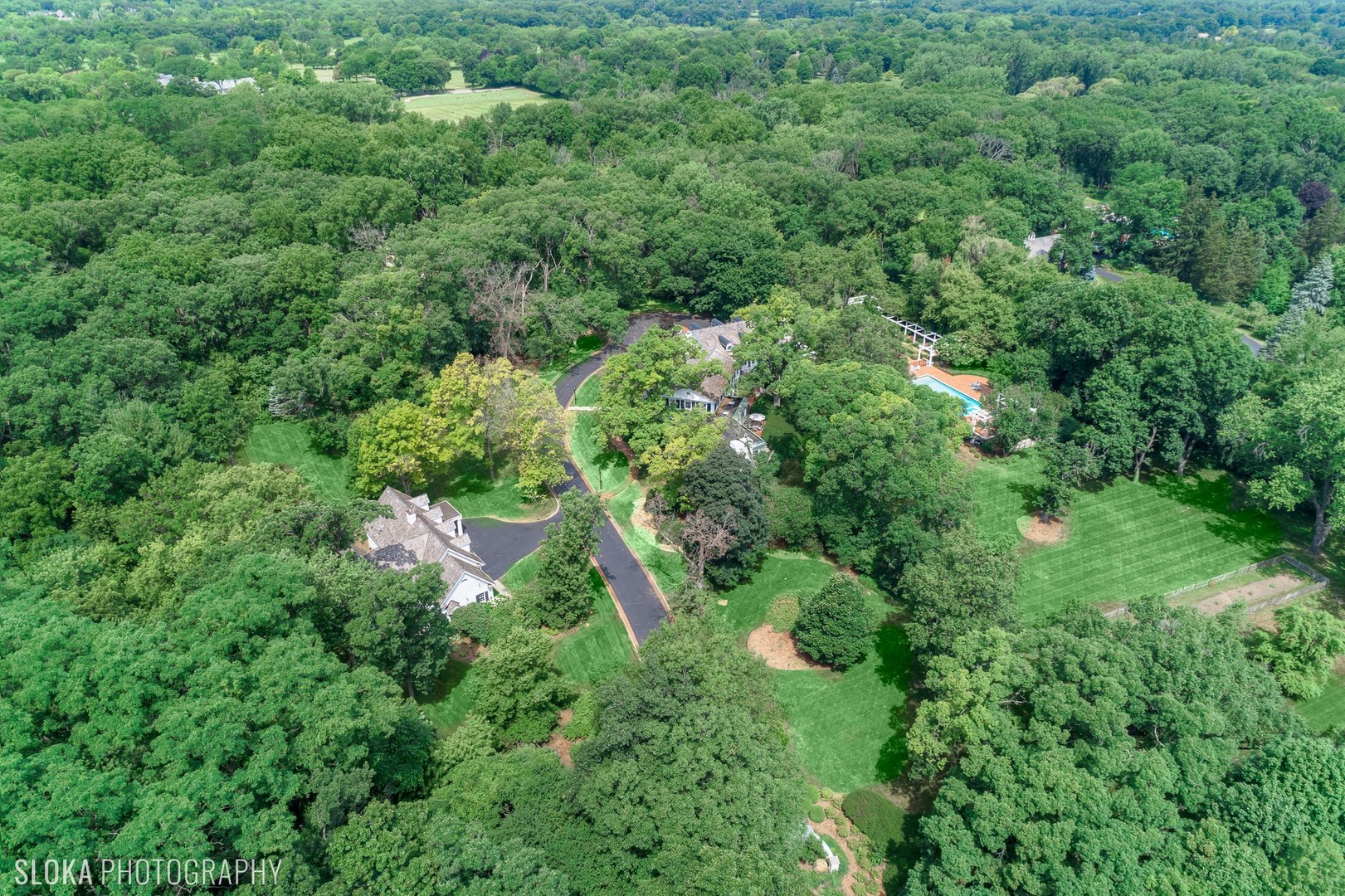 5 West County Line Road Barrington Hills, IL 60010 - Photo 70 of 77 an aerial view of residential house with outdoor space and trees all around