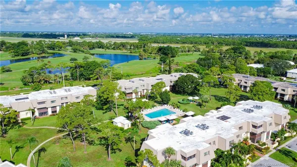a view of a golf course with a lake