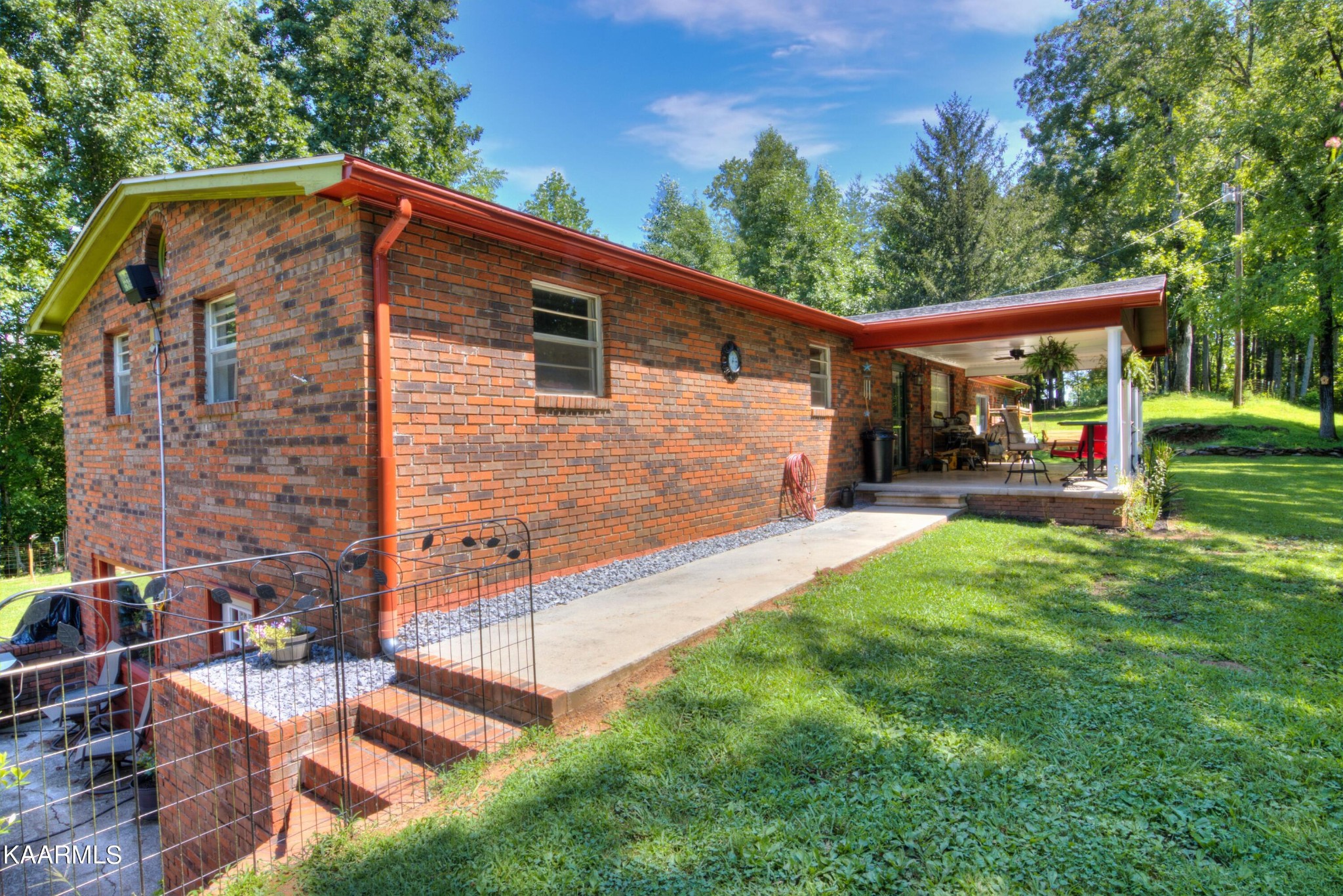 1311 Belltown Road Tellico Plains, TN 37385 - Photo 23 of 58 a view of a house with backyard