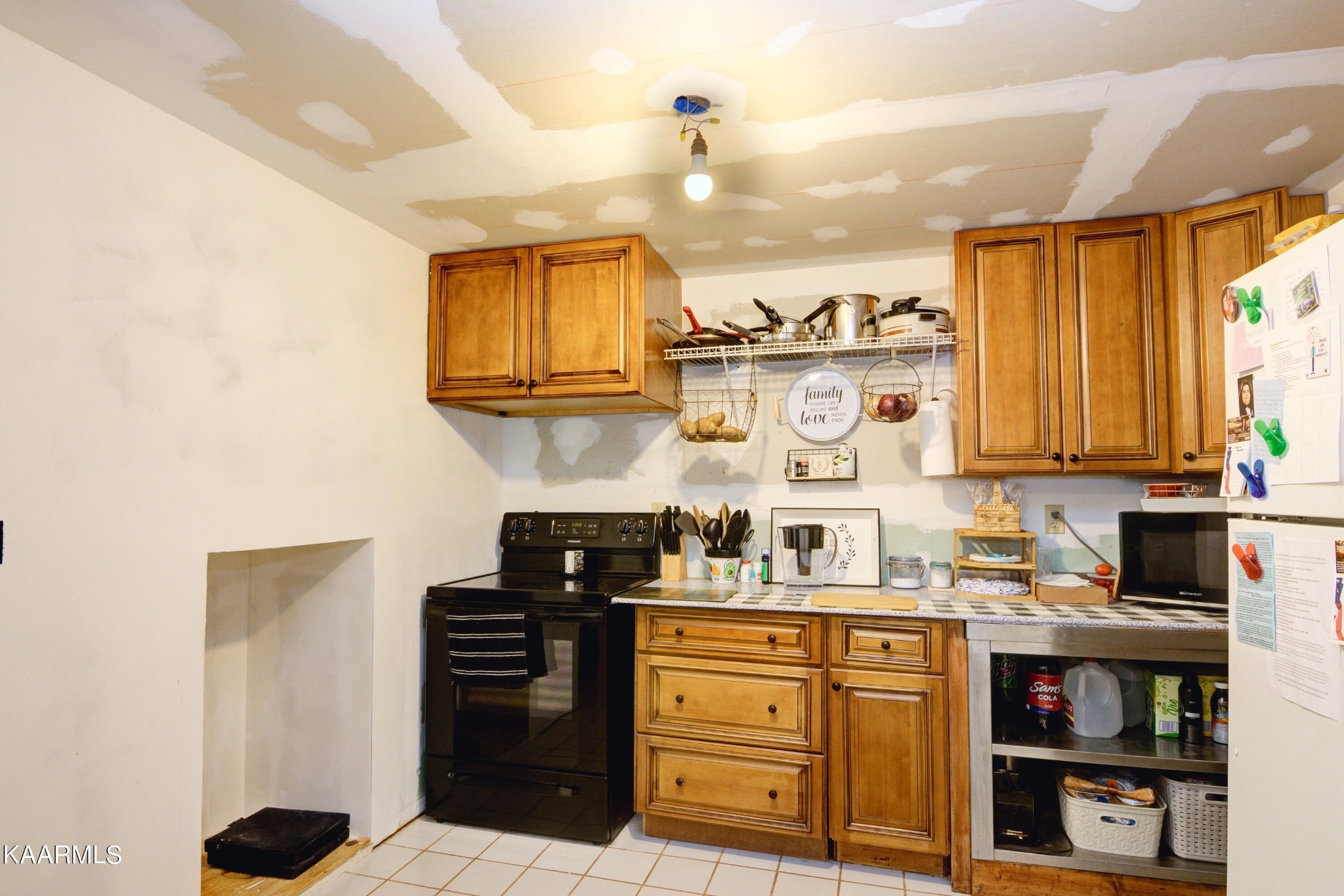 1311 Belltown Road Tellico Plains, TN 37385 - Photo 8 of 58 a kitchen with stainless steel appliances granite countertop a stove and cabinets