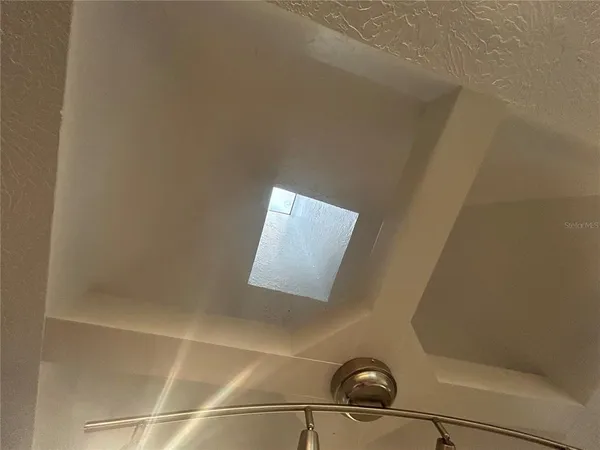 a bathroom with a double vanity sink and mirror