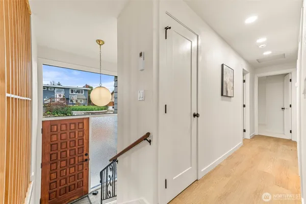a spacious bedroom with a bed and a couch