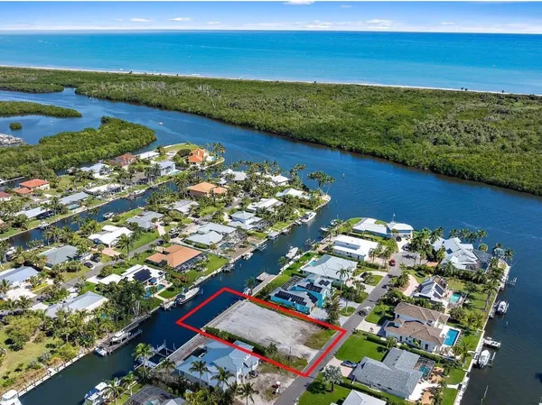 a view of a city with an ocean