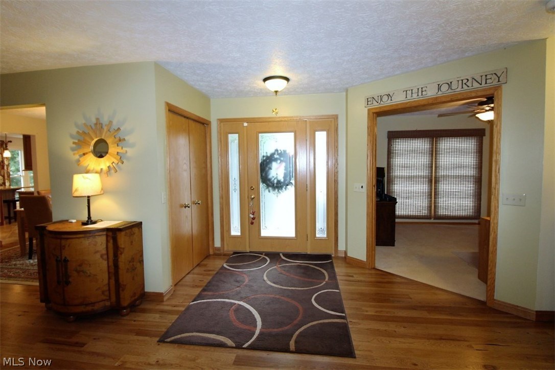 Beautiful Open Foyer Area Enhanced with Hardwood Floor