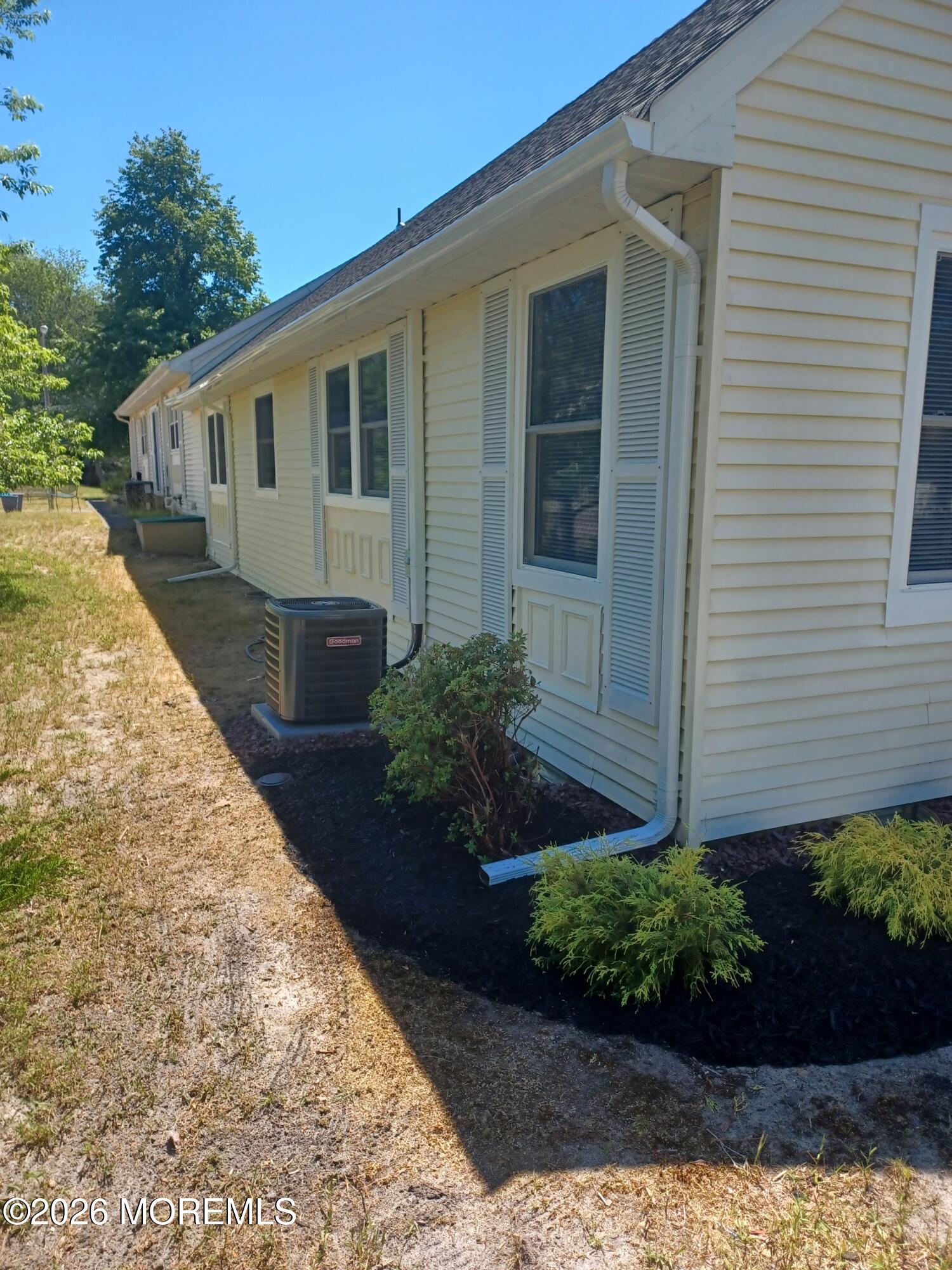 16 D Spring Street, Unit 50 Whiting, NJ 08759 - Photo 4 of 28 a view of a house with backyard and garden
