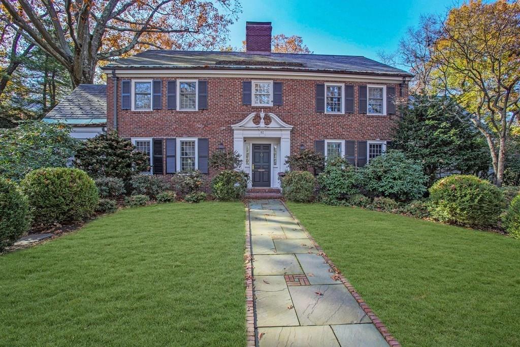 97 Laurel Road Brookline, MA 02467 - Photo 1 of 33 a front view of a house with a yard
