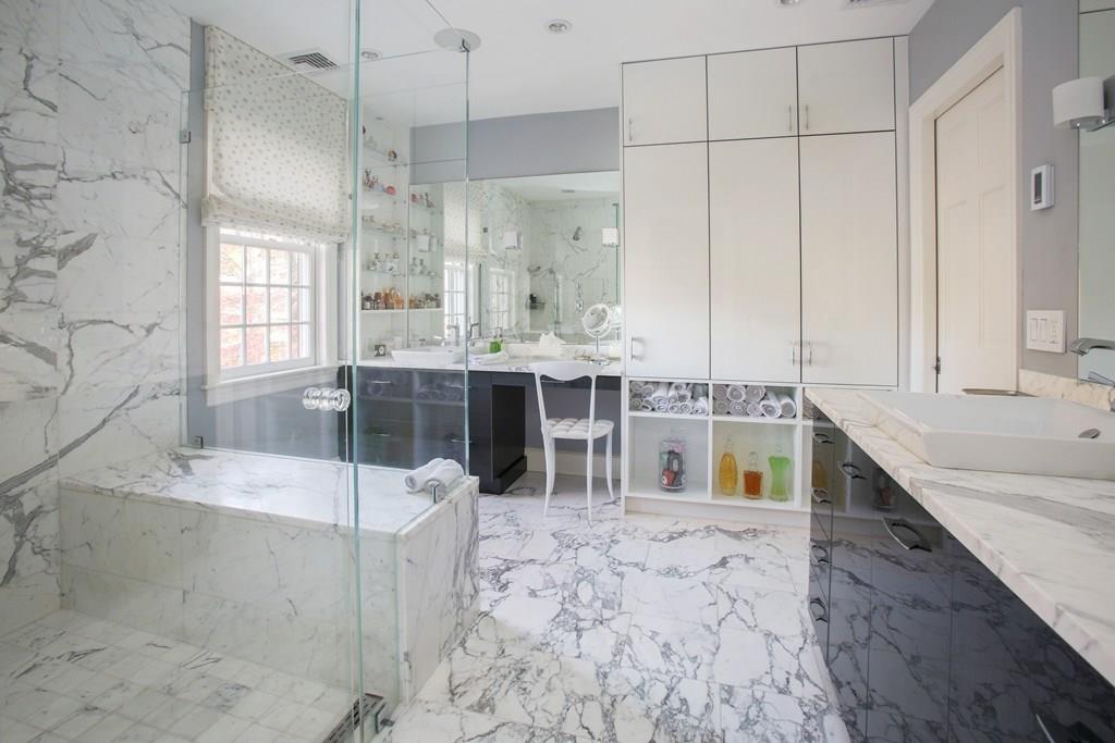 97 Laurel Road Brookline, MA 02467 - Photo 16 of 33 a large bathroom with a tub and window