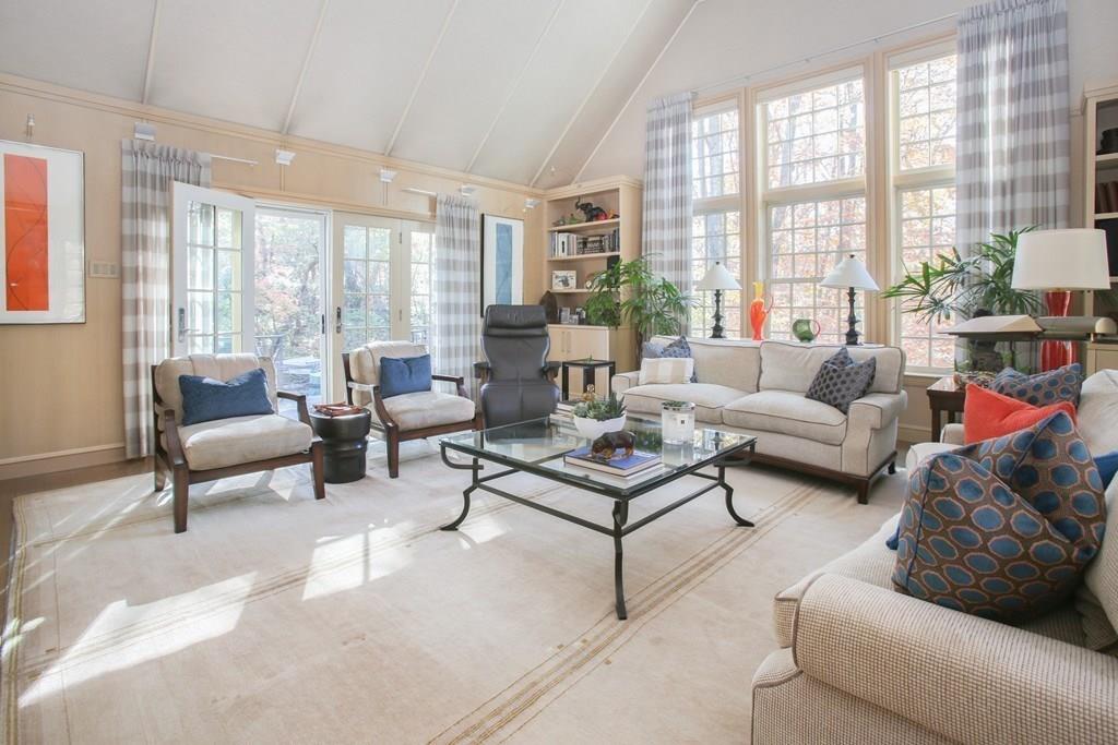 97 Laurel Road Brookline, MA 02467 - Photo 8 of 33 a living room with furniture and a large window