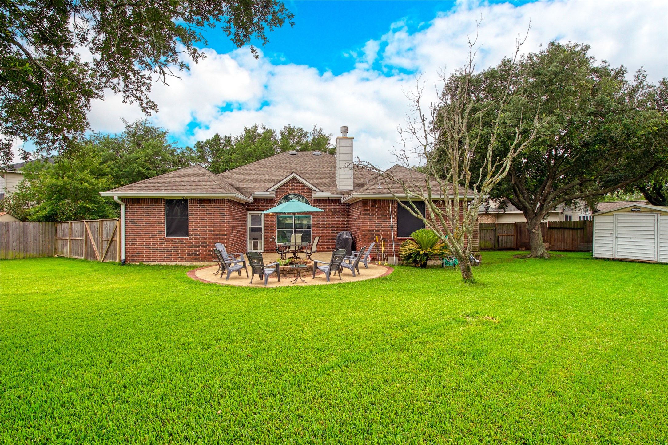 21014 Jessica Rose Lane Spring, TX 77379 - Photo 29 of 30 a view of a house with backyard and garden