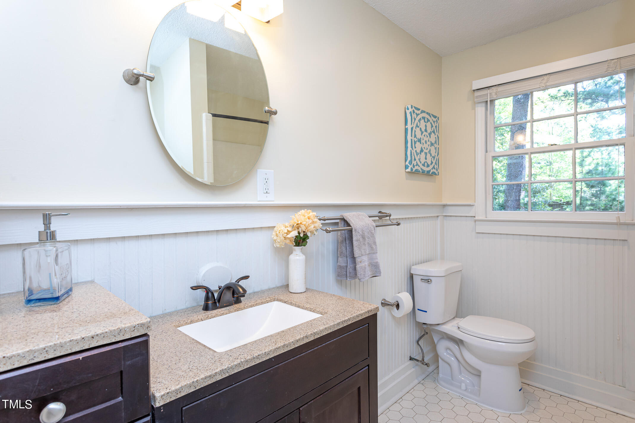 1717 Bayleaf Trail Raleigh, NC 27614 - Photo 23 of 35 a bathroom with a granite countertop toilet sink and mirror