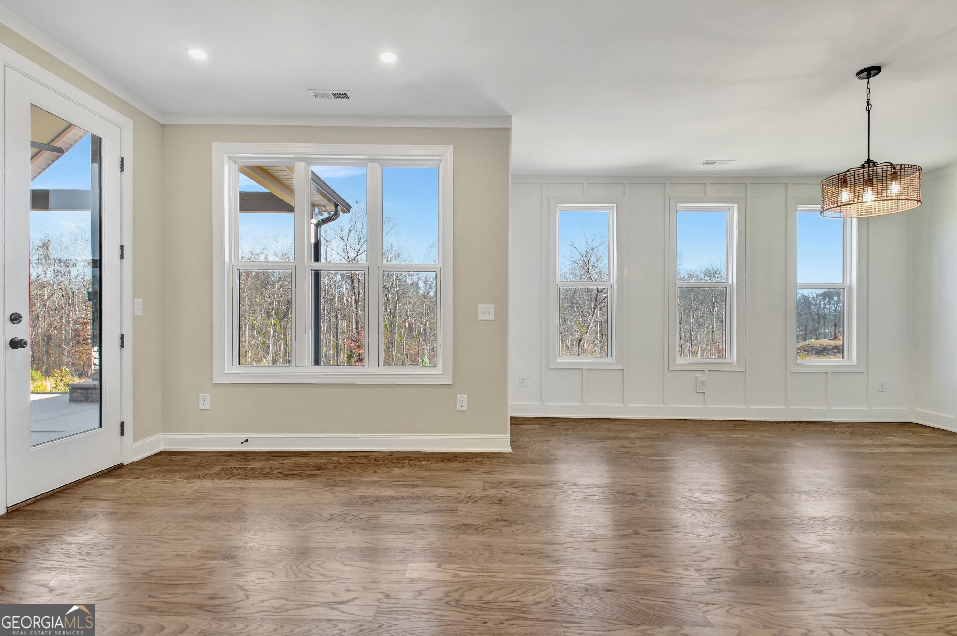 355 Werner Way Senoia, GA 30276 - Photo 35 of 118 a view of an empty room with glass door and windows