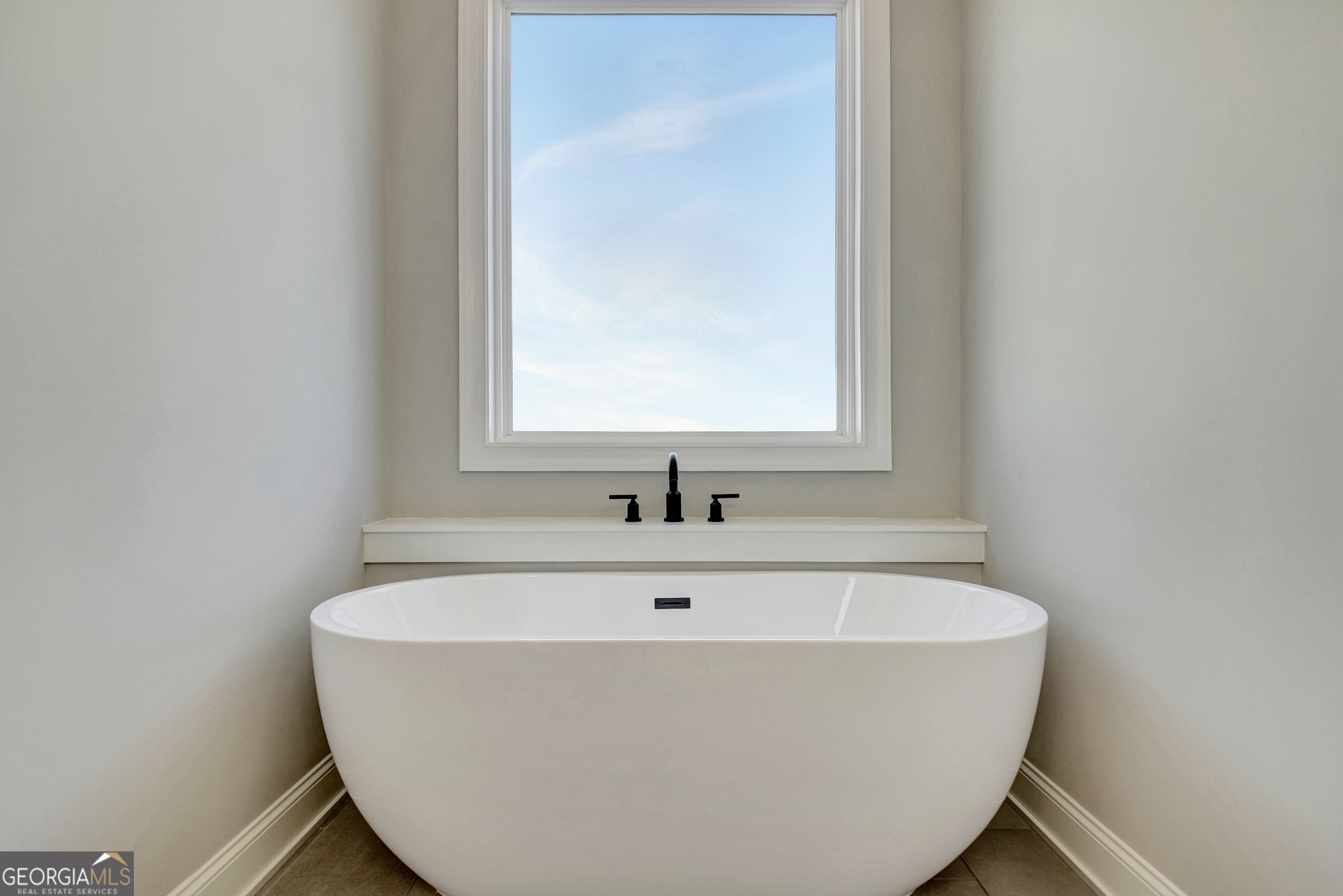 355 Werner Way Senoia, GA 30276 - Photo 52 of 118 a white bath tub sitting in a bathroom