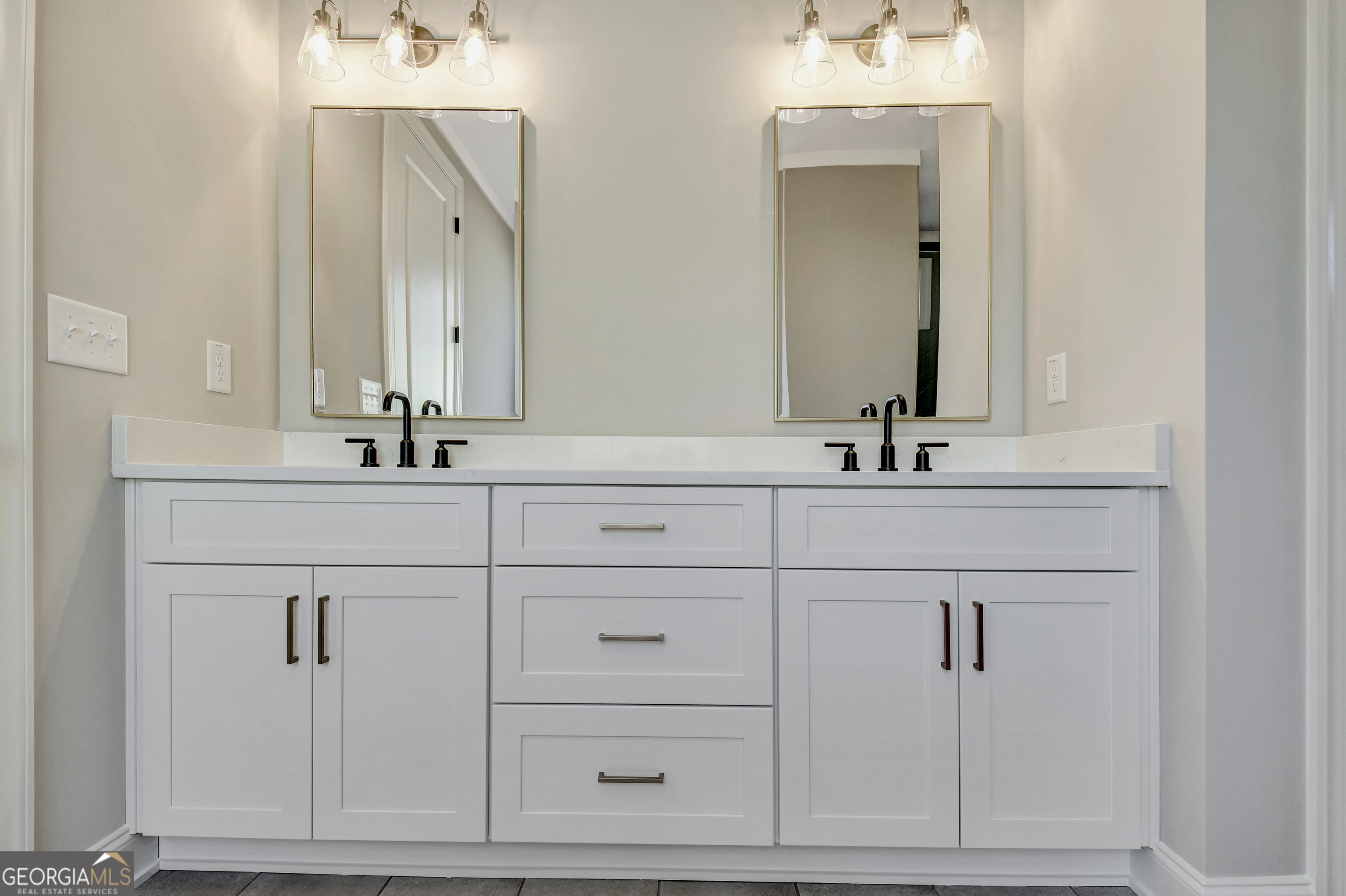 355 Werner Way Senoia, GA 30276 - Photo 53 of 118 a bathroom with a sink vanity and a mirror