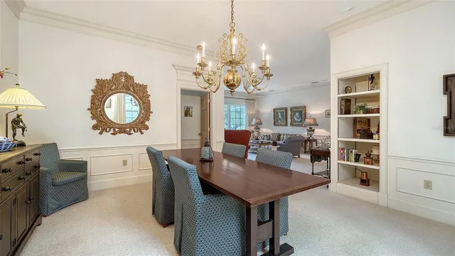 a bathroom with a granite countertop sink mirror and a bathtub