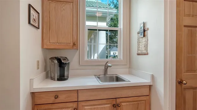 a garden with trees in front of it