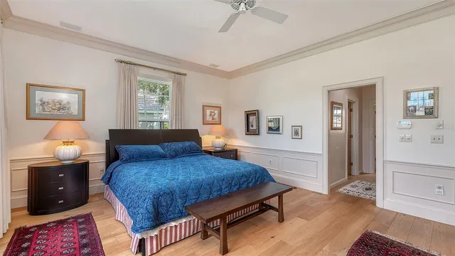 a front view of a house with plants