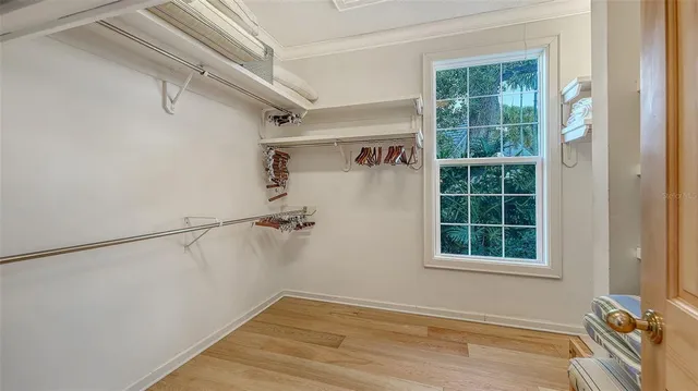 a front view of a building with a garden