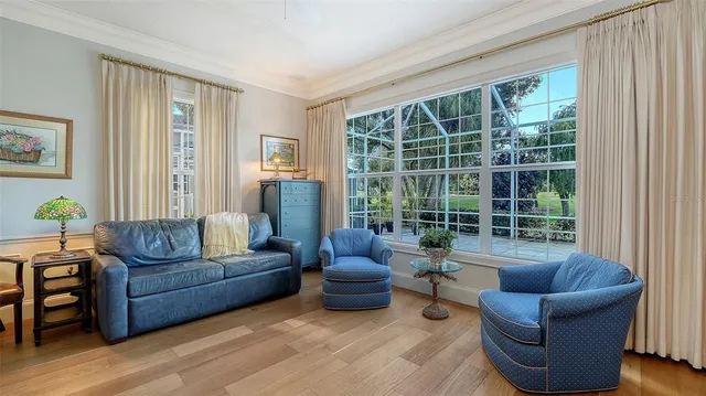 a front view of multiple houses with yard