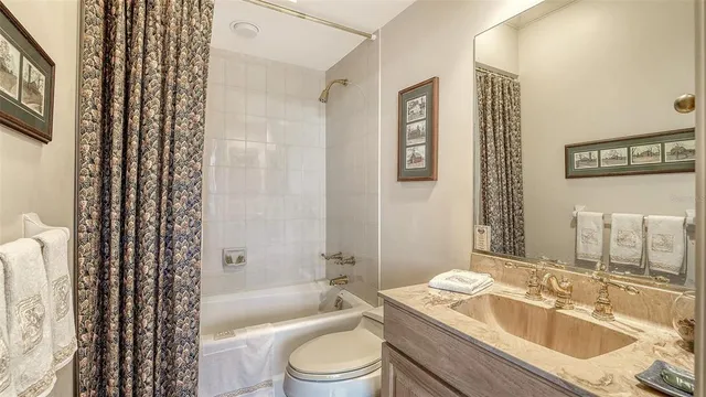 a view of entryway with a chandelier and rug