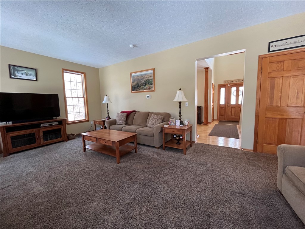 12837 Upton Road Victory, NY 13143 - Photo 9 of 48 Large tastefully decorated living room.