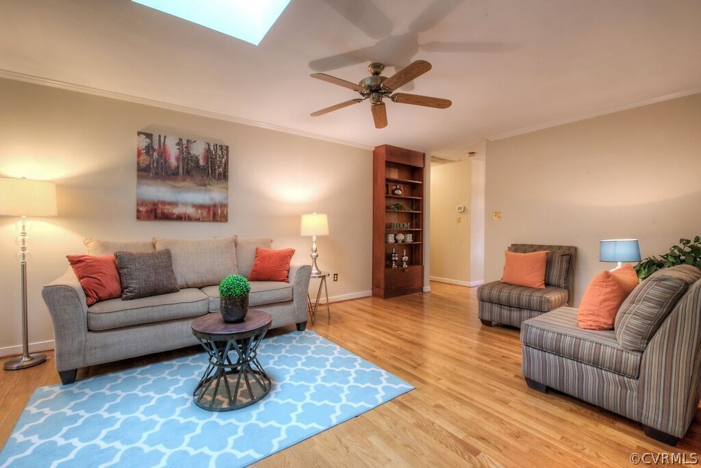 14208 Spring Gate Road Midlothian, VA 23112 - Photo 19 of 44 a living room with furniture and a rug