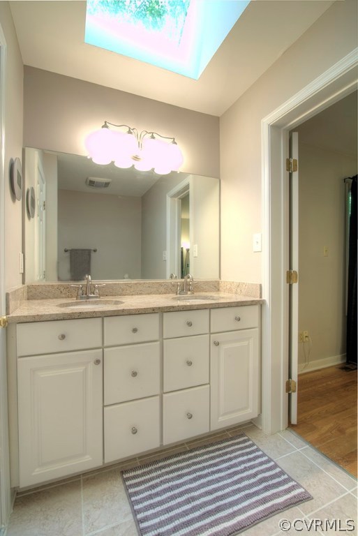14208 Spring Gate Road Midlothian, VA 23112 - Photo 24 of 44 a spacious bathroom with a granite countertop sink a mirror and a shower