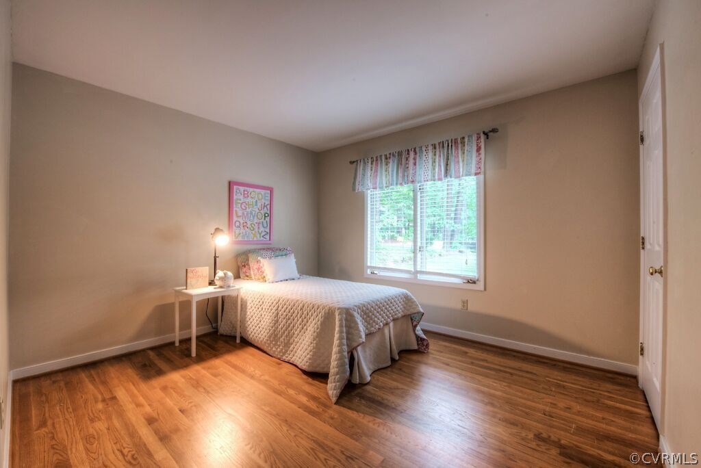 14208 Spring Gate Road Midlothian, VA 23112 - Photo 26 of 44 a bedroom with a bed and a window