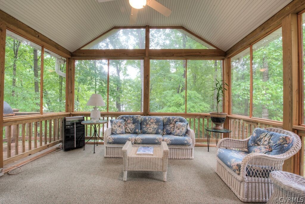 14208 Spring Gate Road Midlothian, VA 23112 - Photo 31 of 44 a living room with furniture and a large window